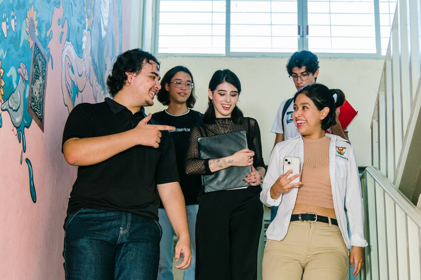 University students socialising on campus stairs, representing the Go Beyond Australian Study Tour